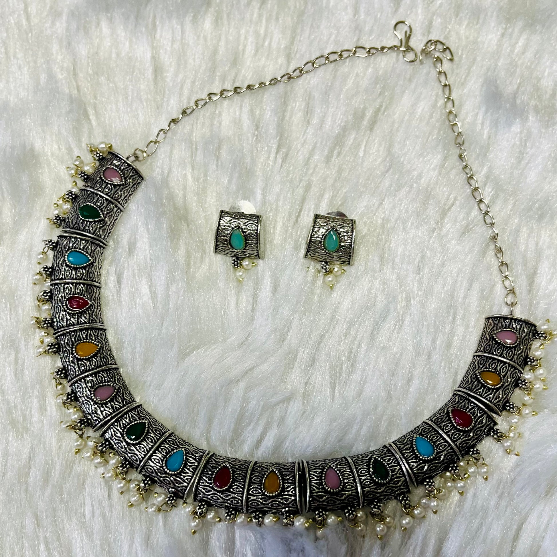 oxidized necklace set, multicolor oxidized jewelry, Indian necklace and earrings, ethnic jewelry set, traditional jewelry for women, boho oxidized necklace, festival wear jewelry, antique silver necklace, handmade necklace earrings set, colorful oxidized necklace, oxidized choker with pearls, statement Indian necklace, tribal style jewelry, oxidized jewellery online India, boho chic necklace set