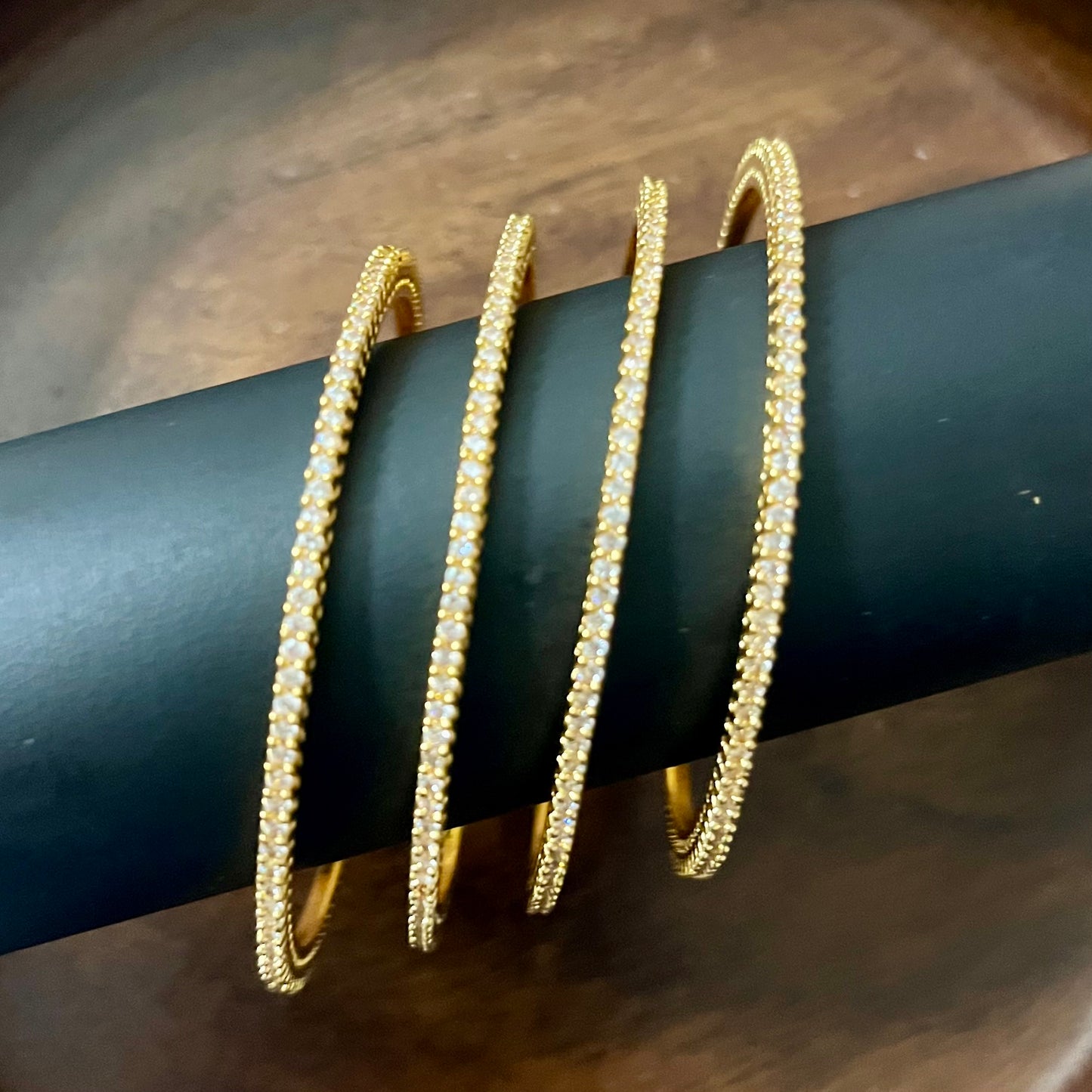 minimalist bangles, crystal bangles, pink stone bangles, gold plated bangles, dainty bangles, everyday wear bangles, party wear bangles, stackable bangles, thin bangles set, American diamond bangles, elegant bangles for women, lightweight bangles, trendy bangles, festive bangles, wedding guest jewelry, handmade bangles India, stylish bangles online, office wear bangles, fashion bangles for girls, bangle set for gifting