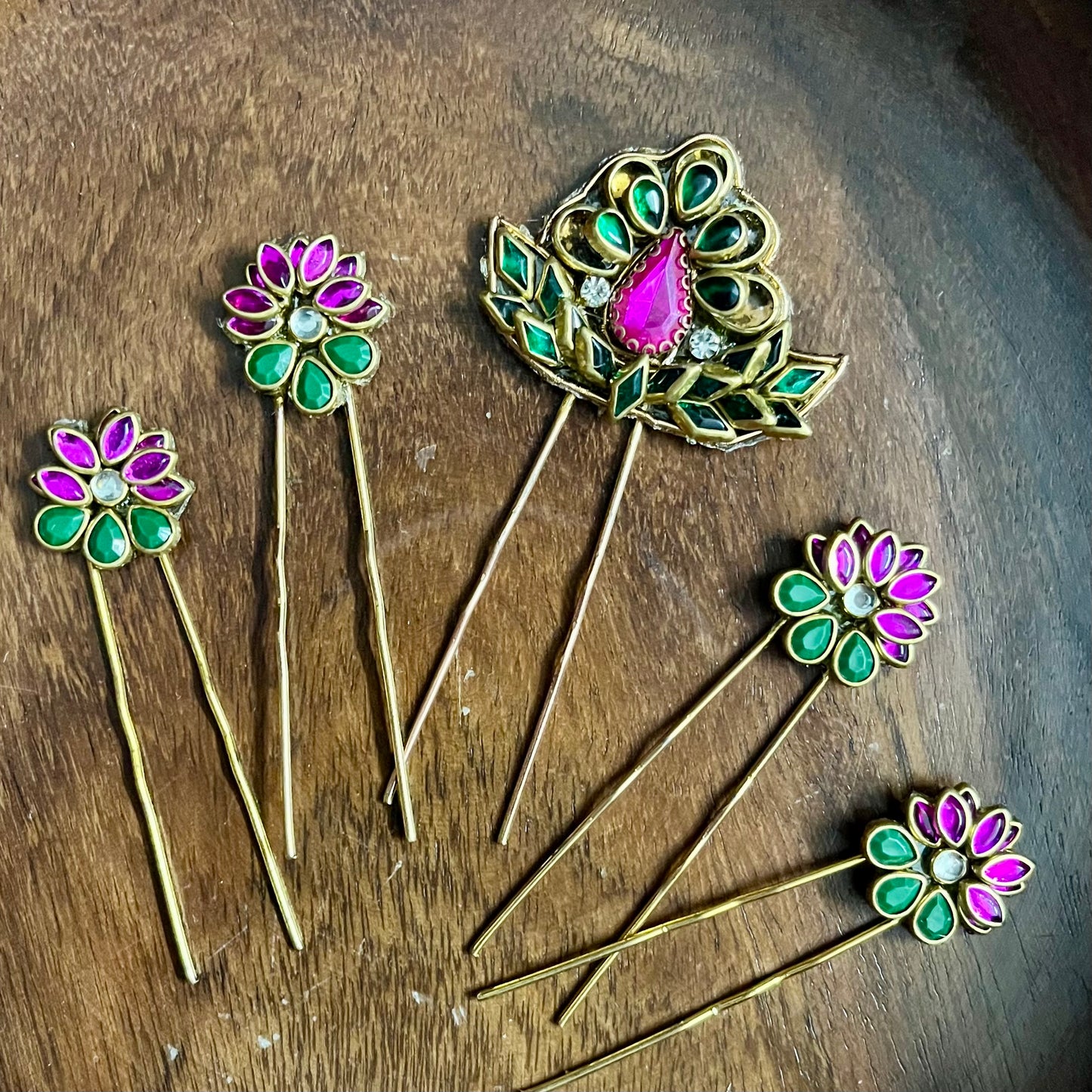 floral hair pins, kundan hair pins, traditional hair accessories, bridal hair pins, pink and green hair pins, Indian hair accessories, ethnic hair pins, festive hair accessories, wedding hair pins, bun pins for women, South Indian hair pins, kundan style pins, hair accessories for saree, handmade hair pins, designer hair accessories, gold plated hair pins, floral hair jewelry, pearl hair pins, hair pins for lehenga, Chandrika Petal Pins
