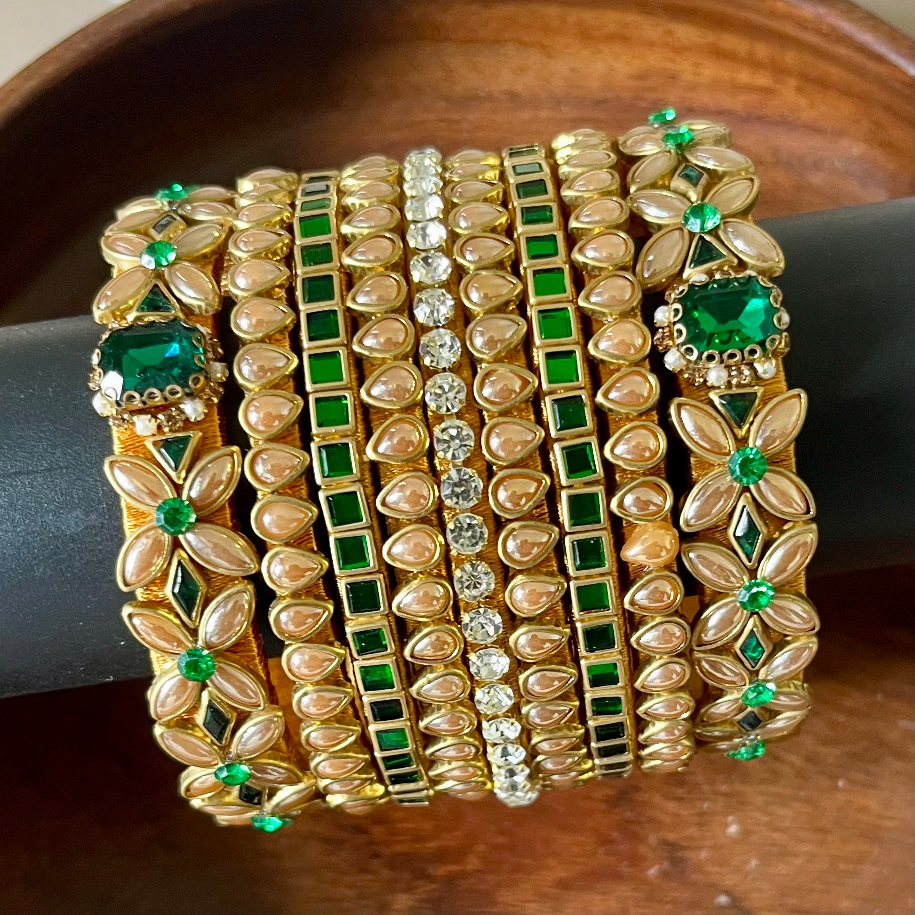 green gold bangle set, kundan bangle set, bridal bangles, traditional bangles, festive bangles, Indian bangle set, emerald bangle set, gold bangles for women, kundan jewelry, wedding bangles, designer bangle set, floral bangles, pearl bangles, handcrafted bangles, ethnic wear accessories, bangle set for saree, bangle set for lehenga, silk thread bangles, bangles for gifting, party wear bangles