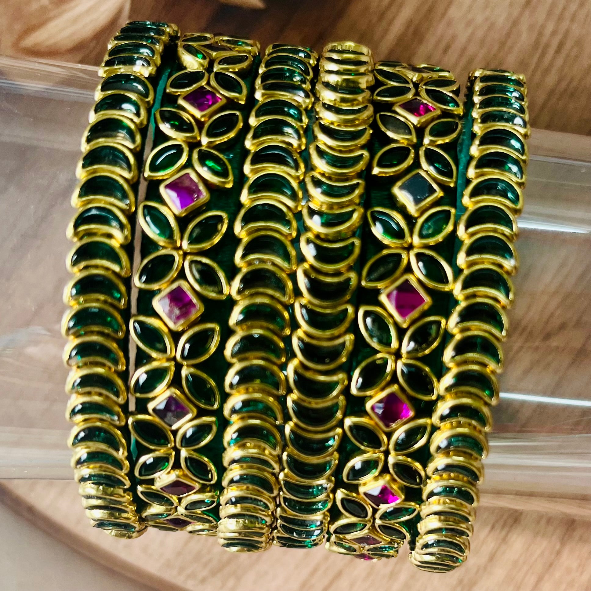 traditional bangles, kundan bangles, green bangles, ruby bangles, bridal bangles, Indian jewelry, handmade bangles, ethnic bangles, festive wear bangles, silk thread bangles, gold tone bangles, designer bangles, wedding bangles, South Indian bangles, bangle set for women