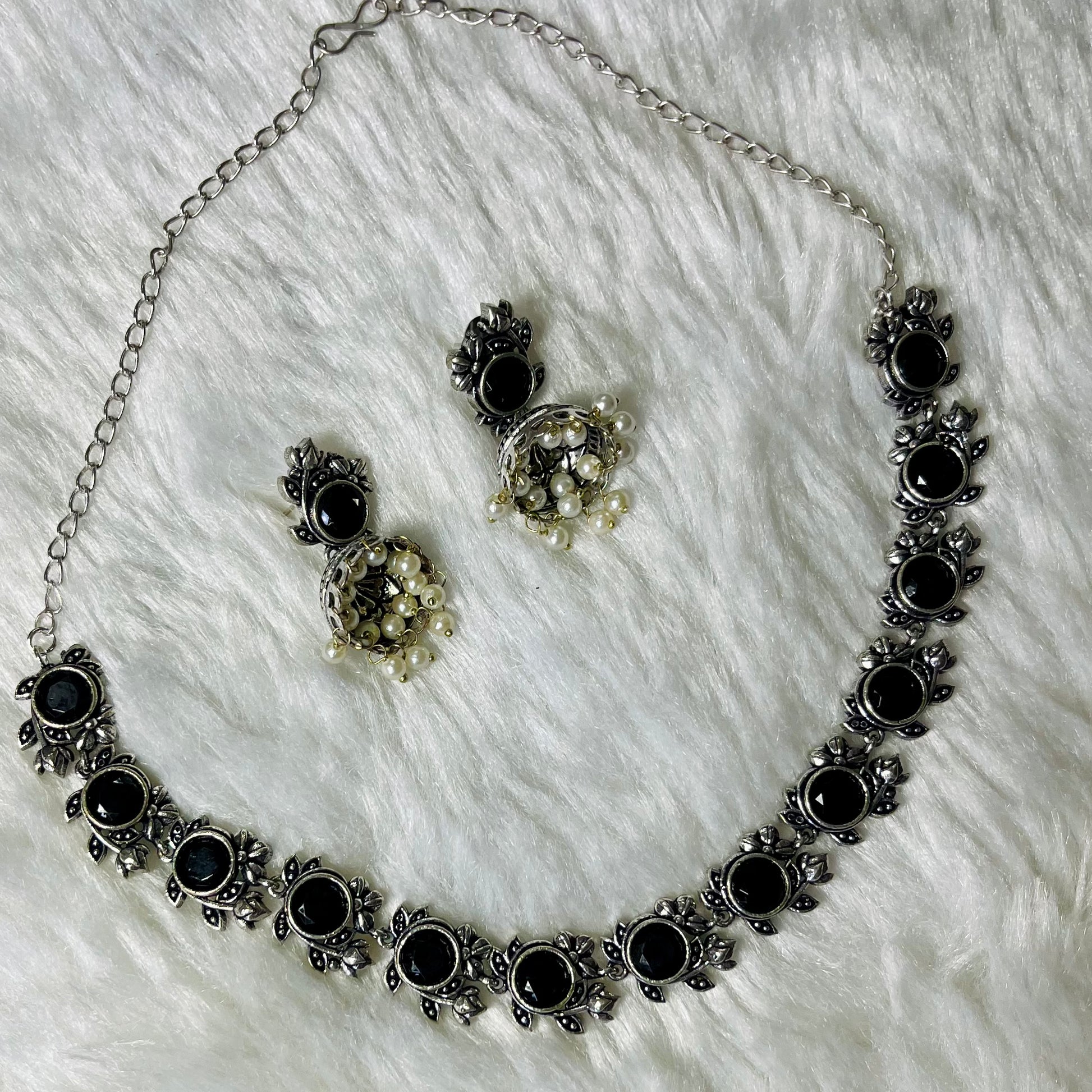 oxidized jewelry set, black stone necklace, floral oxidized choker, tribal necklace for women, antique finish jewelry, handmade oxidized necklace, ethnic black choker, silver oxidized set, pearl drop earrings, women’s statement jewelry, traditional Indian necklace, oxidized metal jewelry, handcrafted jewelry India, desi accessories, black floral necklace set