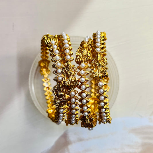 Pearl Lakshmi bangles, traditional bangles, handmade bangles, Indian jewelry, traditional jewelry, ethnic bangles, bridal bangles, pearl bangles, Lakshmi design bangles, Matsya Boutique, Bangalore jewelry