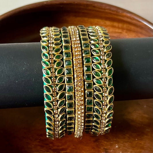 green bangles, gold bangles, bangle set, traditional bangles, Indian bangles, festive jewelry, bridal bangles, emerald bangles, ethnic jewelry, designer bangles, wedding accessories, party wear bangles, handmade bangles, stone bangles, jewelry for saree