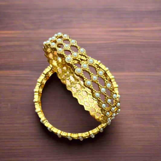 pearl mesh bangles, gold tone bangles, bridal bangles set, traditional kada bangles, pearl kada for women, ethnic bangle set, Indian wedding bangles, festive wear bangles, gold pearl kada, handcrafted bangles, royal pearl bangles, mesh design bangles, kundan style bangles, designer bangles online, party wear bangles for saree