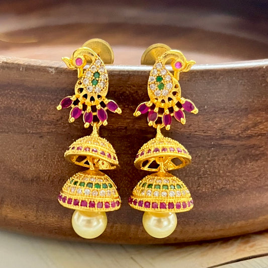 peacock jhumkas, traditional earrings, gold plated jhumkas, ethnic jewellery, indian earrings, festive earrings, party wear jhumkas, kundan earrings, bridal jewellery, designer jhumkas, temple jewellery, jhumka earrings, double layer jhumkas, colorful jhumkas, statement earrings, south indian jewellery, wedding earrings, handmade earrings, boutique earrings, Matsya Boutique