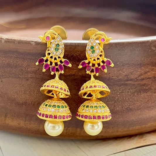 peacock jhumkas, traditional earrings, gold plated jhumkas, ethnic jewellery, indian earrings, festive earrings, party wear jhumkas, kundan earrings, bridal jewellery, designer jhumkas, temple jewellery, jhumka earrings, double layer jhumkas, colorful jhumkas, statement earrings, south indian jewellery, wedding earrings, handmade earrings, boutique earrings, Matsya Boutique