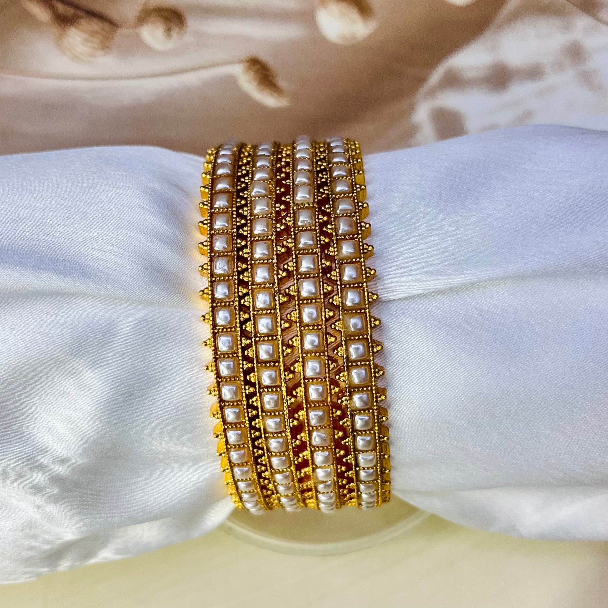 gold look alike pearl bangles, traditional jewelry, ethnic bangles, Indian accessories, handmade bangles, bridal bangles, festive jewelry, wedding jewelry, elegant bangles, handcrafted jewelry, pearl bangles, imitation jewelry, gold finish bangles, Indian jewelry online, Matsya Boutique