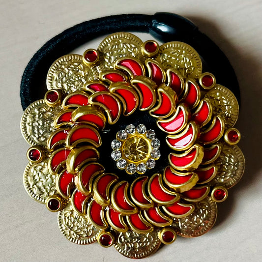 Surya Kalika hair accessory, juda pin, traditional hair accessory, bridal hair brooch, red gold hair clip, bun pin for saree, ethnic hair ornament, Indian hair accessory, juda hair brooch, wedding hair pin, kundan style hair pin, temple jewelry accessory, South Indian hair clip, festive hair accessory, handmade hair brooch, floral bun pin, juda accessory for women, ethnic hair clip, hair accessory for lehenga, designer juda pin