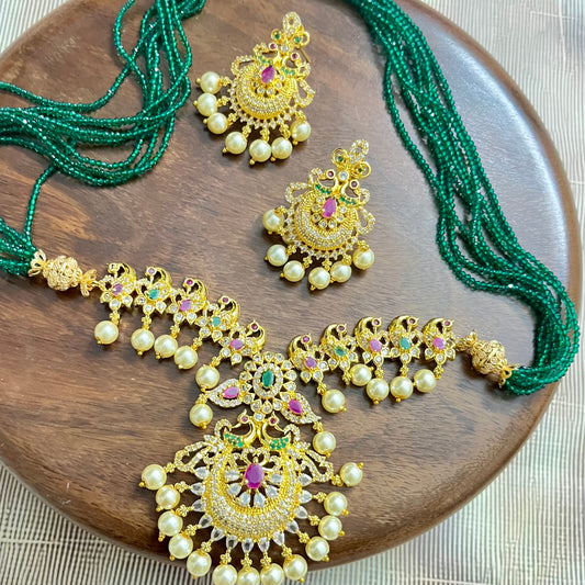 peacock jewelry set, temple jewelry, bridal necklace set, traditional Indian jewelry, antique gold necklace, pearl choker set, wedding jewelry, South Indian jewelry, handcrafted jewelry, emerald bead necklace, designer jewelry set, ethnic necklace set, statement earrings, imitation jewelry, festive jewelry