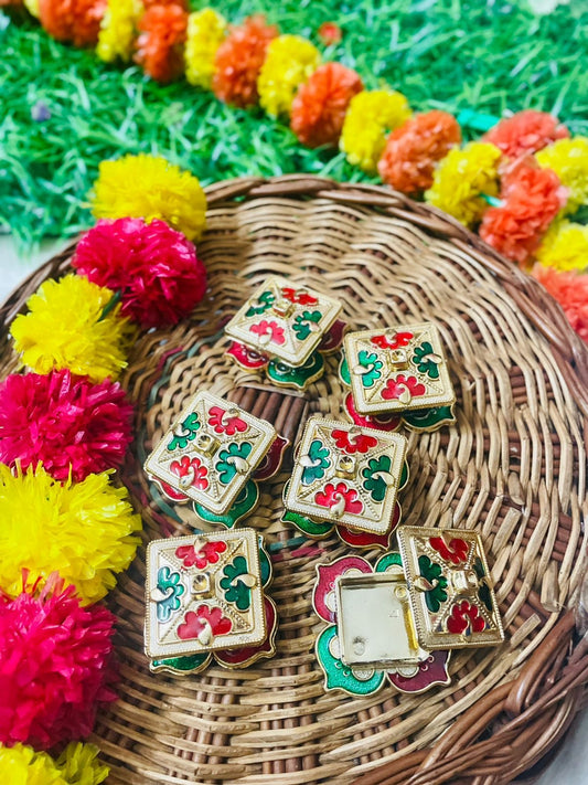 "Traditional kumkum box with intricate detailing, designed for storing kumkum and other sacred powders, ideal for religious rituals and gifting."