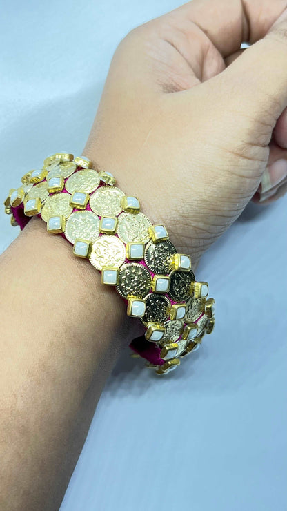 Pink thread with pear and laksmi kassu bangle