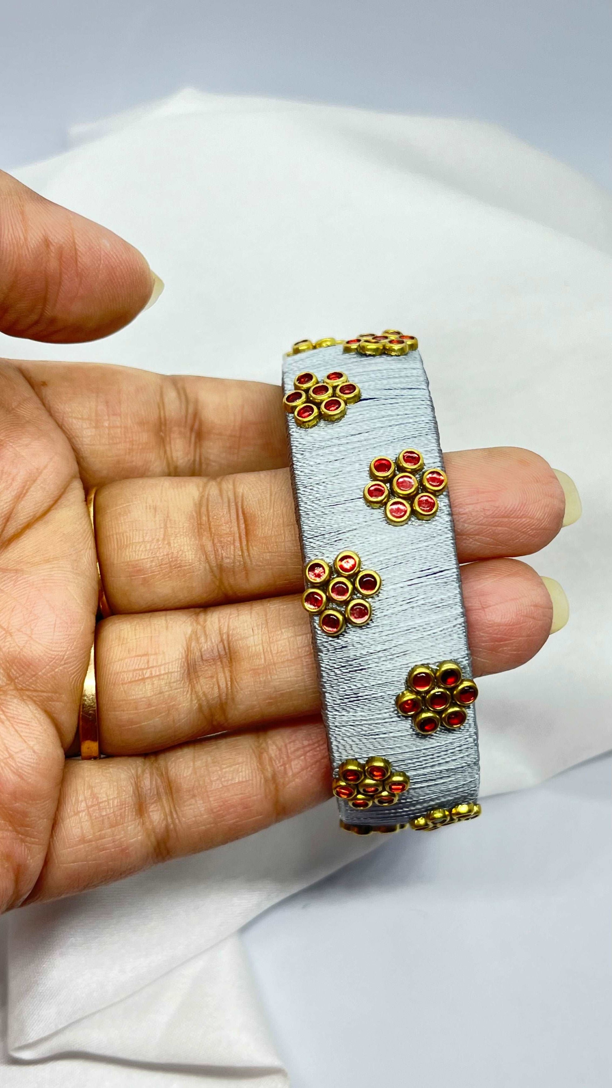 Grey thread red Kundan flowers