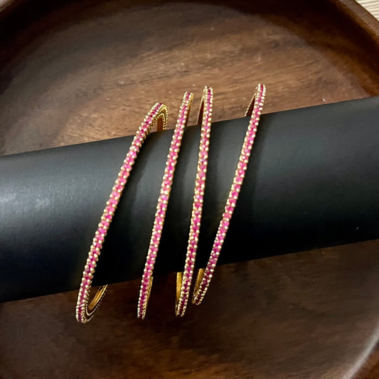 minimalist bangles, crystal bangles, pink stone bangles, gold plated bangles, dainty bangles, everyday wear bangles, party wear bangles, stackable bangles, thin bangles set, American diamond bangles, elegant bangles for women, lightweight bangles, trendy bangles, festive bangles, wedding guest jewelry, handmade bangles India, stylish bangles online, office wear bangles, fashion bangles for girls, bangle set for gifting