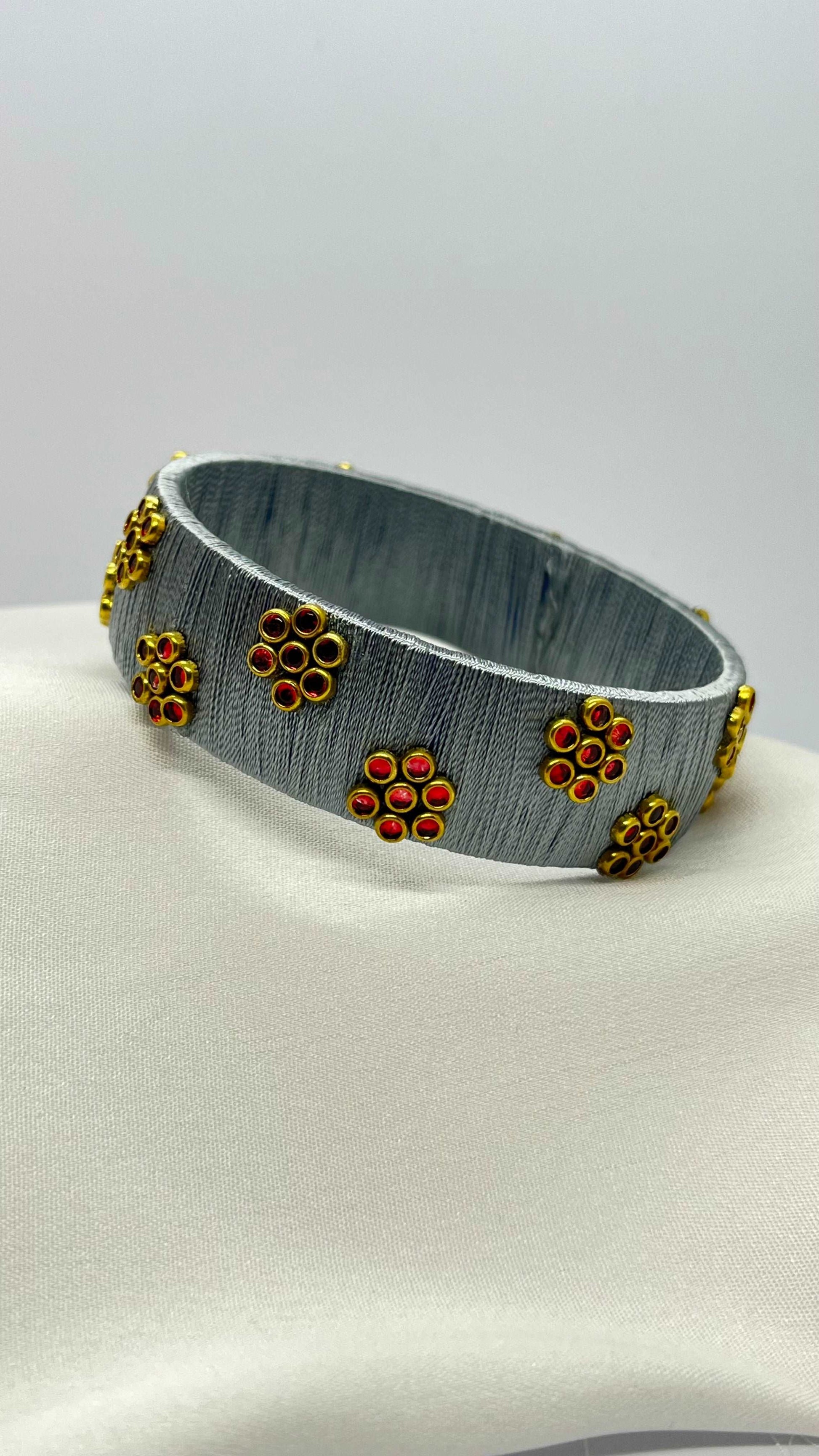 Grey thread red Kundan flowers