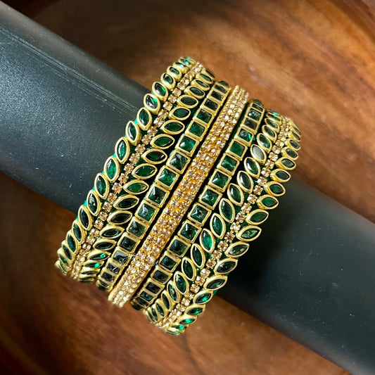 green bangles, gold bangles, bangle set, traditional bangles, Indian bangles, festive jewelry, bridal bangles, emerald bangles, ethnic jewelry, designer bangles, wedding accessories, party wear bangles, handmade bangles, stone bangles, jewelry for saree