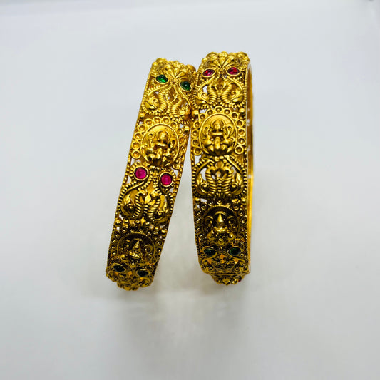 “Stylish artificial bangles with a contemporary design, crafted with high-quality materials and embellished with sparkling stones, ideal for festive and casual wear.”