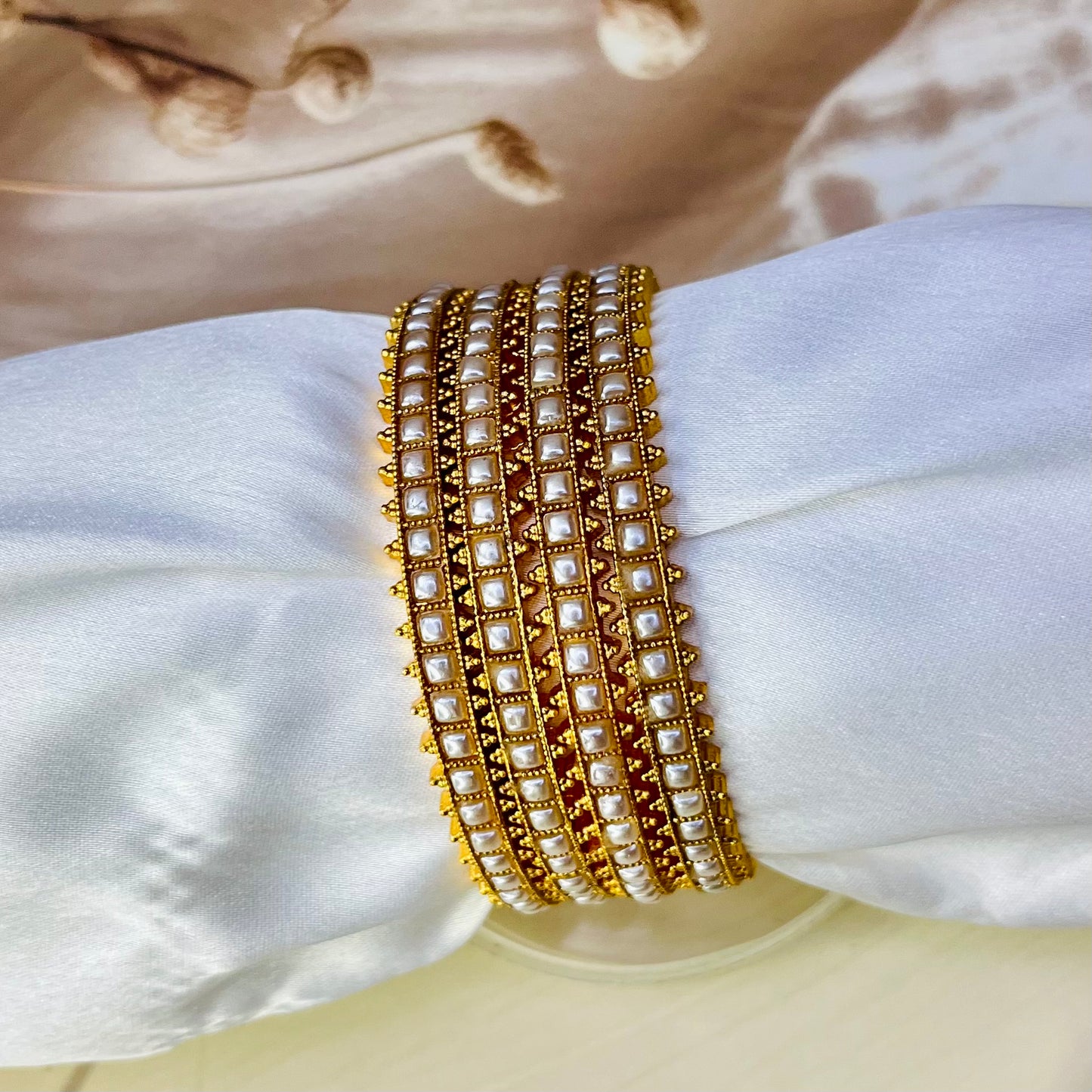 gold look alike pearl bangles, traditional jewelry, ethnic bangles, Indian accessories, handmade bangles, bridal bangles, festive jewelry, wedding jewelry, elegant bangles, handcrafted jewelry, pearl bangles, imitation jewelry, gold finish bangles, Indian jewelry online, Matsya Boutique