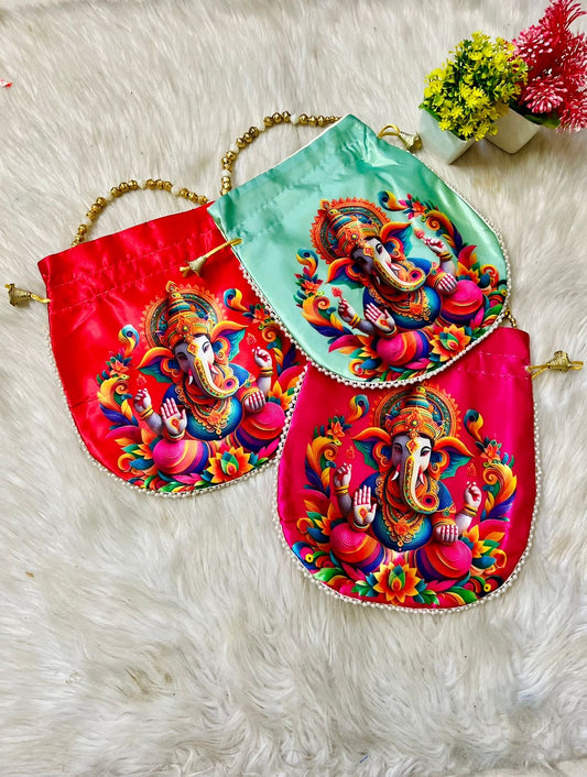 "Puliyar potlis featuring traditional designs inspired by Lord Ganesha, crafted with vibrant colors and intricate detailing, ideal for carrying prasadam or as auspicious return gifts during religious celebrations."