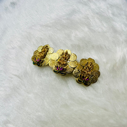 Lakshmi kaasu center clip, Lakshmi coin hair clip, Lakshmi design center clip, Lakshmi kaasu hair accessory, Gold Lakshmi kaasu clip, Traditional Lakshmi hair clip, Lakshmi kaasu bridal clip, Lakshmi coin jewelry accessory, Handmade Lakshmi kaasu clip, Lakshmi kaasu clip for women, South Indian Lakshmi kaasu clip, Lakshmi kaasu decorative clip, Lakshmi kaasu festive hair clip, Antique style Lakshmi center clip, Lakshmi kaasu clip for special occasions.