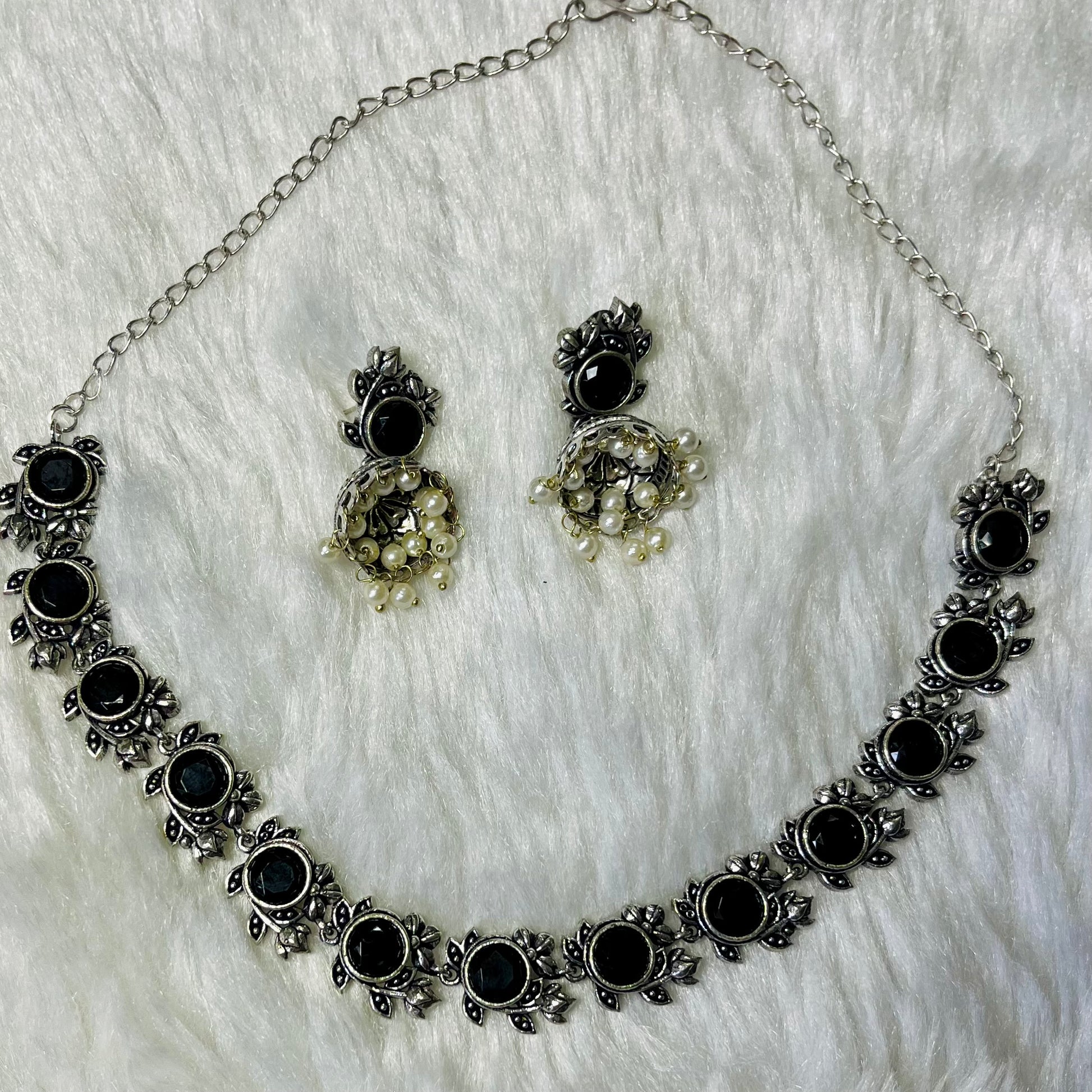 oxidized jewelry set, black stone necklace, floral oxidized choker, tribal necklace for women, antique finish jewelry, handmade oxidized necklace, ethnic black choker, silver oxidized set, pearl drop earrings, women’s statement jewelry, traditional Indian necklace, oxidized metal jewelry, handcrafted jewelry India, desi accessories, black floral necklace set