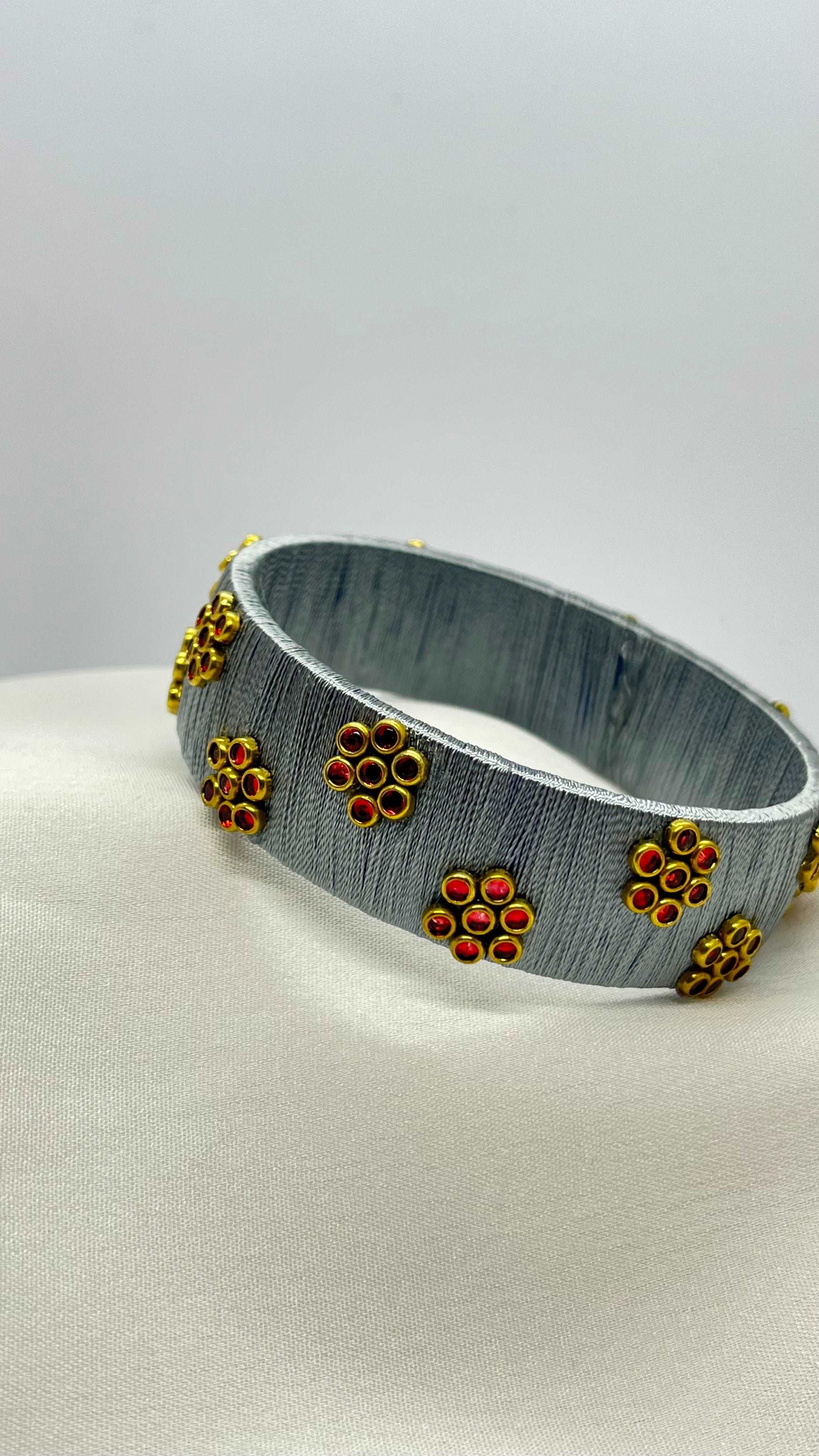 Grey thread red Kundan flowers