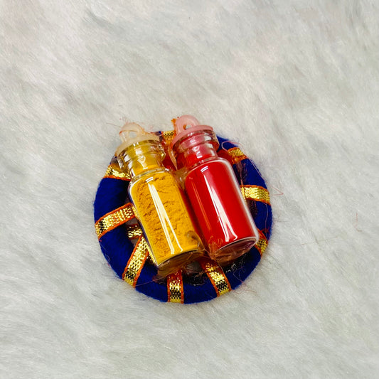 Silk-thread bangle Haldi Kumkum holder in royal blue with gold accents, holding small glass bottles of turmeric (haldi) and vermillion (kumkum), used for traditional Indian ceremonies and blessings.

 Silk thread bangle Haldi Kumkum holder, Indian ritual decor, traditional Haldi Kumkum accessory, Indian ceremony essentials, handmade bangle Haldi Kumkum.