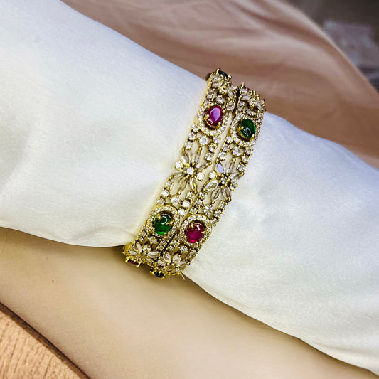 antique bangle, floral bangle design, gemstone bangle, traditional Indian jewelry, royal bangle, handmade jewelry, luxury Indian accessories, ethnic bangle, bridal jewelry India, handcrafted jewelry, vintage style bangle, Indian gemstone jewelry, luxury jewelry India, statement bangle, intricate bangle design