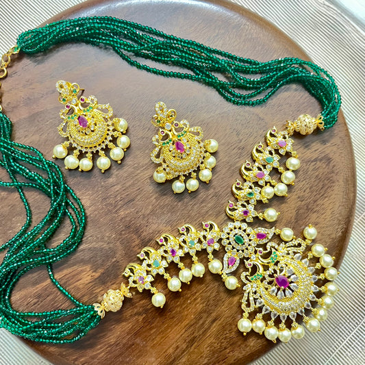 peacock jewelry set, temple jewelry, bridal necklace set, traditional Indian jewelry, antique gold necklace, pearl choker set, wedding jewelry, South Indian jewelry, handcrafted jewelry, emerald bead necklace, designer jewelry set, ethnic necklace set, statement earrings, imitation jewelry, festive jewelry