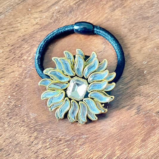 floral hairband, kundan hair tie, designer hair accessory, ethnic hairband, handmade hair tie, festive hair accessory, hairband with stones, stylish hair elastic, golden flower hairband, traditional hair accessory, bridal hair tie, kundan jewelry hairband, Indian hair accessory, elegant hairband for women, trendy hair accessory