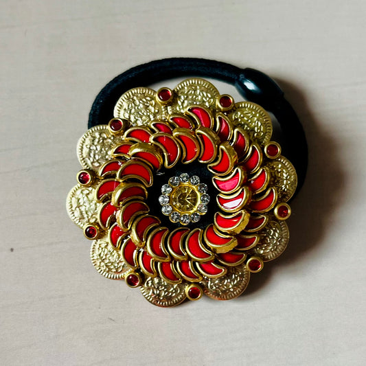 Surya Kalika hair accessory, juda pin, traditional hair accessory, bridal hair brooch, red gold hair clip, bun pin for saree, ethnic hair ornament, Indian hair accessory, juda hair brooch, wedding hair pin, kundan style hair pin, temple jewelry accessory, South Indian hair clip, festive hair accessory, handmade hair brooch, floral bun pin, juda accessory for women, ethnic hair clip, hair accessory for lehenga, designer juda pin