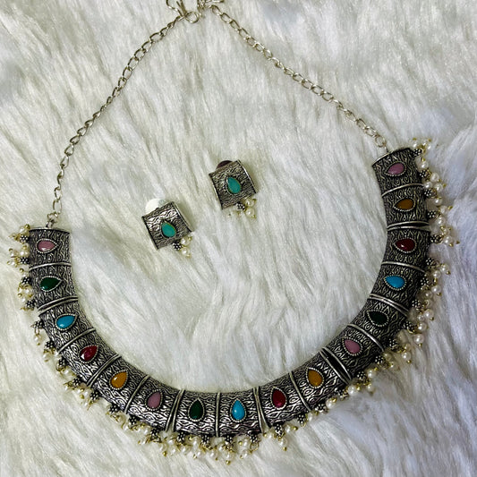 oxidized necklace set, multicolor oxidized jewelry, Indian necklace and earrings, ethnic jewelry set, traditional jewelry for women, boho oxidized necklace, festival wear jewelry, antique silver necklace, handmade necklace earrings set, colorful oxidized necklace, oxidized choker with pearls, statement Indian necklace, tribal style jewelry, oxidized jewellery online India, boho chic necklace set