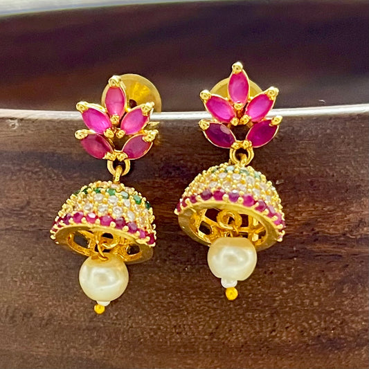Traditional jewelry, South Indian jewelry, ruby jhumka, handcrafted earrings, Indian festive jewelry, wedding jewelry, Kanjeevaram saree accessories, silk lehenga jewelry, pearl jhumka, ethnic earrings, handmade jewelry India, bridal earrings, classical dance jewelry, festive accessories, gold tone jewelry, floral jhumka, lightweight earrings, Indian heritage jewelry, ethnic fashion accessories, royal jewelry, Indian traditional earrings, statement jhumkas, Indian ethnic wear, festival jewelry, Matsya Bouti