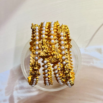 Pearl Lakshmi bangles, traditional bangles, handmade bangles, Indian jewelry, traditional jewelry, ethnic bangles, bridal bangles, pearl bangles, Lakshmi design bangles, Matsya Boutique, Bangalore jewelry